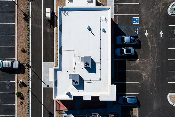 Boost drive thru coffee and energy drinks aerial view store location lot layout